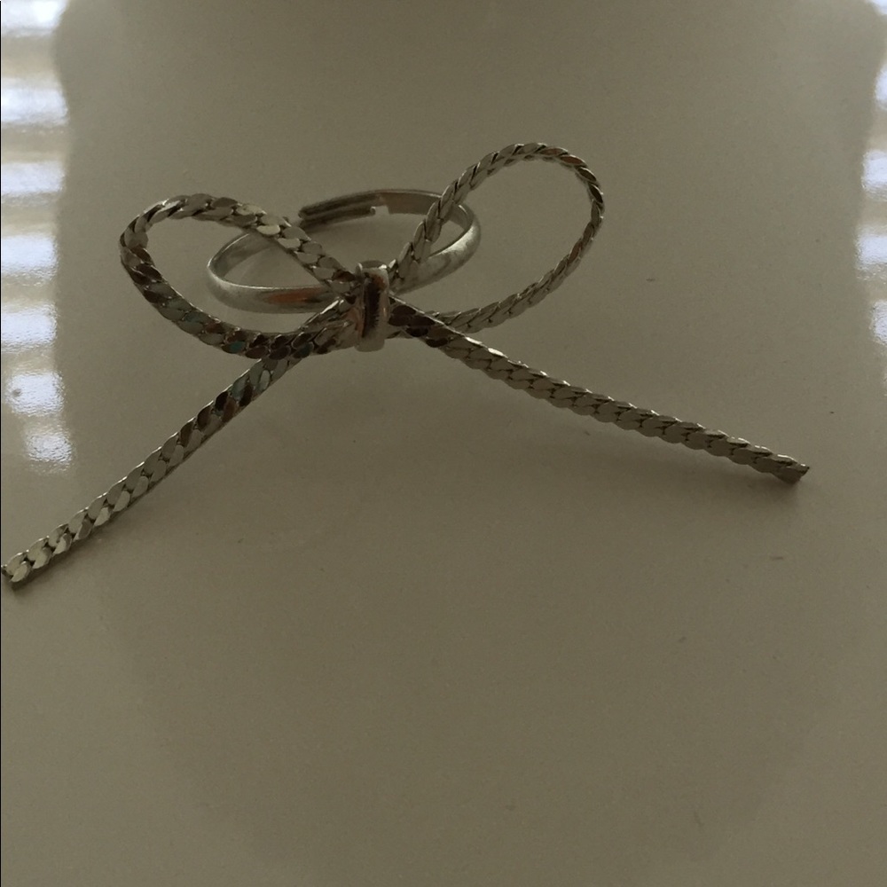 Silver adjustable bow-tie ring